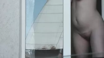 Spying from car on a neighbor who washes window completely naked,  public, voyeur