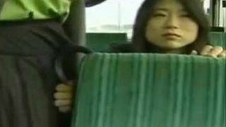 Two Japanese Girls Grope Each Other's Pussies on Public bus