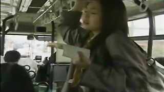 Two Japanese Girls Grope Each Other's Pussies on Public bus