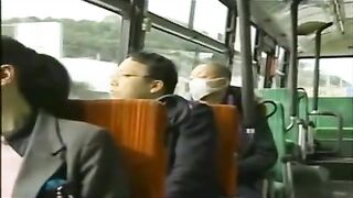 Two Japanese Girls Grope Each Other's Pussies on Public bus