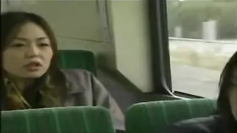 Two Japanese Girls Grope Each Other's Pussies on Public bus