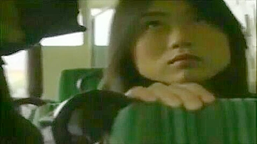 Two Japanese Girls Grope Each Other's Pussies on Public bus
