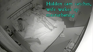 Hidden cam catches, wife wakes up Masturbating while husband sleeps next to!