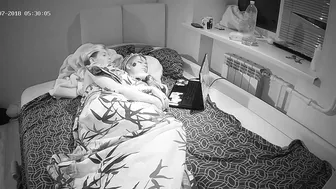 A caught sister is fingering the attractive bitch in night time hidden cam vid