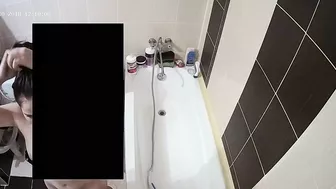 She caught sister in the bathtub and joined her for a dual sesh of getting clean