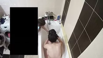 She caught sister in the bathtub and joined her for a dual sesh of getting clean