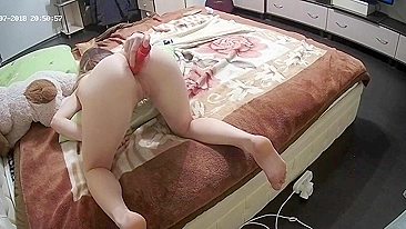 He caught sister on camera while bending over and putting a giant toy in her