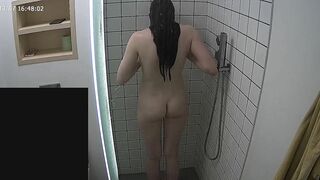 Another video featuring a caught sister making her entire body wet in the shower