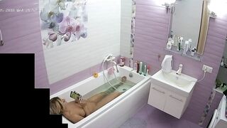 The blonde woman is just chilling in the tub looking for some caught sister porn