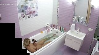 The blonde woman is just chilling in the tub looking for some caught sister porn