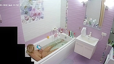 The blonde woman is just chilling in the tub looking for some caught sister porn