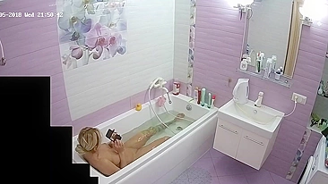 The blonde woman is just chilling in the tub looking for some caught sister porn