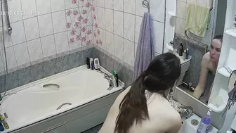 Another caught sister is blissfully unaware that the camera is filming her