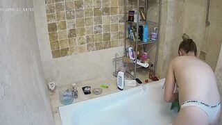 The hidden cam caught sister preparing to get in the bathtub and be nasty