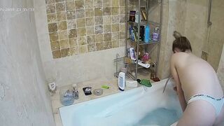 The hidden cam caught sister preparing to get in the bathtub and be nasty