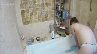 The hidden cam caught sister preparing to get in the bathtub and be nasty