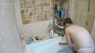 The hidden cam caught sister preparing to get in the bathtub and be nasty