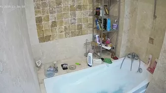 The hidden cam caught sister preparing to get in the bathtub and be nasty