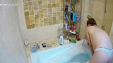 The hidden cam caught sister preparing to get in the bathtub and be nasty