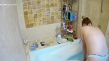 The hidden cam caught sister preparing to get in the bathtub and be nasty