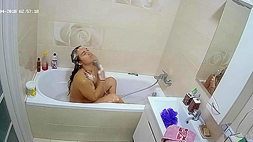 Part two of the caught sister video which features her getting clean in the tub