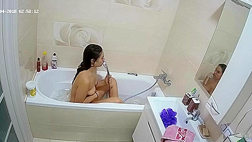 Part two of the caught sister video which features her getting clean in the tub