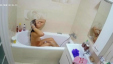 Part two of the caught sister video which features her getting clean in the tub