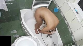 A hidden camera put on the top of the bath leads to another caught sister