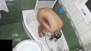 A hidden camera put on the top of the bath leads to another caught sister