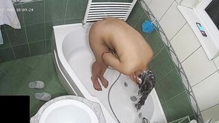 A hidden camera put on the top of the bath leads to another caught sister