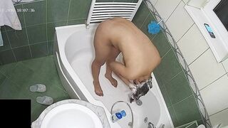 A hidden camera put on the top of the bath leads to another caught sister