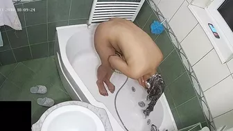 A hidden camera put on the top of the bath leads to another caught sister