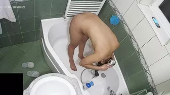 A hidden camera put on the top of the bath leads to another caught sister