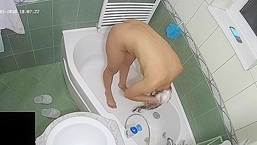 A hidden camera put on the top of the bath leads to another caught sister