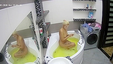 I caught sister trying to put a mask on her face while relaxing in the bathtub