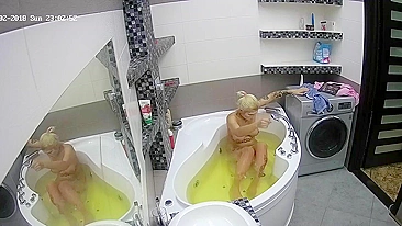 I caught sister trying to put a mask on her face while relaxing in the bathtub