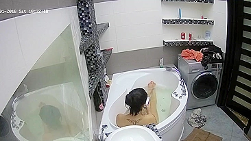 Caught sister relaxing in the small tub and thinks about maybe masturbating