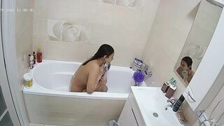 A random camera in the bathroom caught sister rubbing her figure in the tub