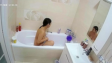 A random camera in the bathroom caught sister rubbing her figure in the tub
