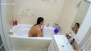 A random camera in the bathroom caught sister rubbing her figure in the tub
