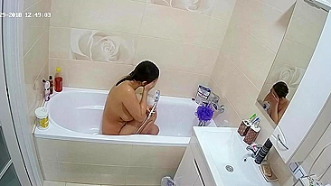 A random camera in the bathroom caught sister rubbing her figure in the tub