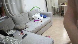 The camera leads to a caught sister squatting and using a vibrating sex toy