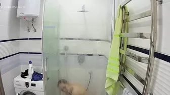 The video features a caught sister by her stepbrother in the steamy bathroom