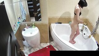 Another caught sister with a fat ass is naked while showing off in the bath