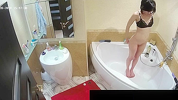 Another caught sister with a fat ass is naked while showing off in the bath