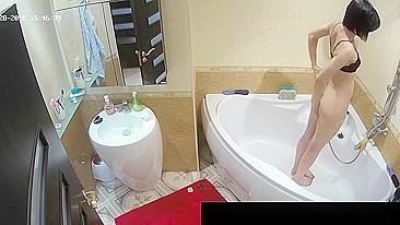 Another caught sister with a fat ass is naked while showing off in the bath
