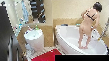 Another caught sister with a fat ass is naked while showing off in the bath