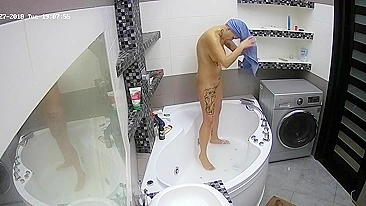 Another caught sister is oblivious to the fact that someone is spying on her