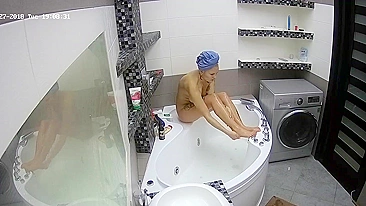 Another caught sister is oblivious to the fact that someone is spying on her