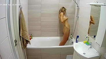 The hidden cam caught sister naked in the tub while trying to get cleaner